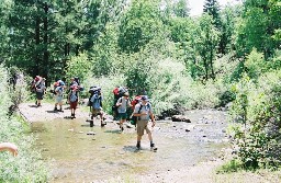 Crossing the Rayado near Rayado River Camp